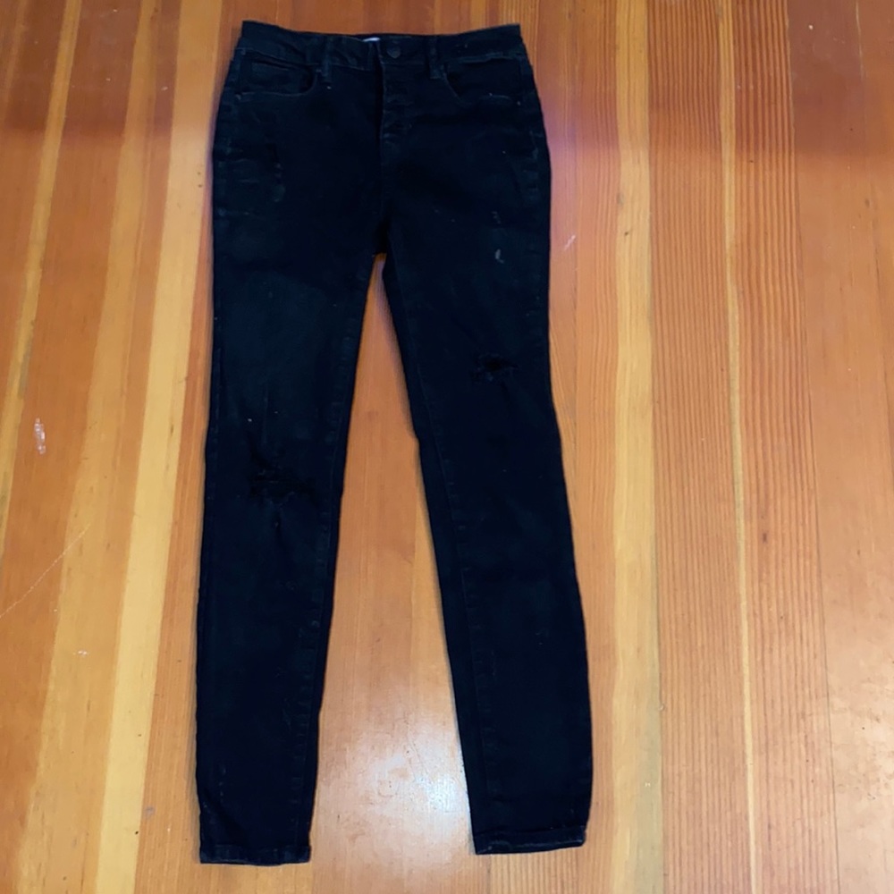 Girls black ripped skinny jeans